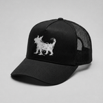 A black trucker-style cap with a white embroidered Beans dog silhouette on the front panel, shown against a neutral light gray background.